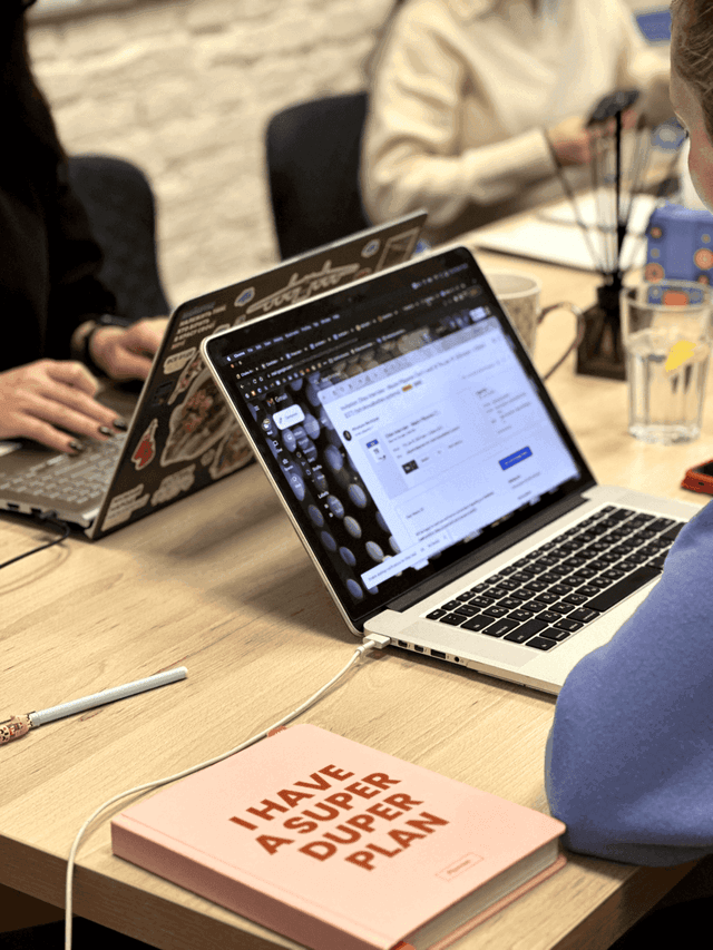laptop with notebook